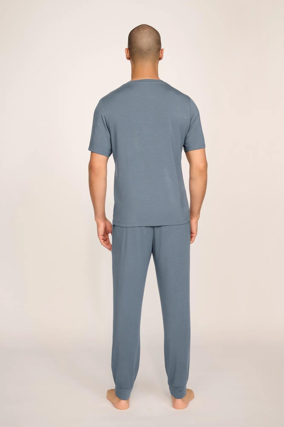 Model is wearing Henry TENCEL™ Modal Short Sleeve & Pant PJ Set in Moonlight Blue
