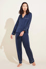 Model is wearing Inez Washable Silk Long PJ Set in navy/ivory.