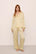 Model is wearing Inez Washable Silk Long PJ Set in  Sunshine/White