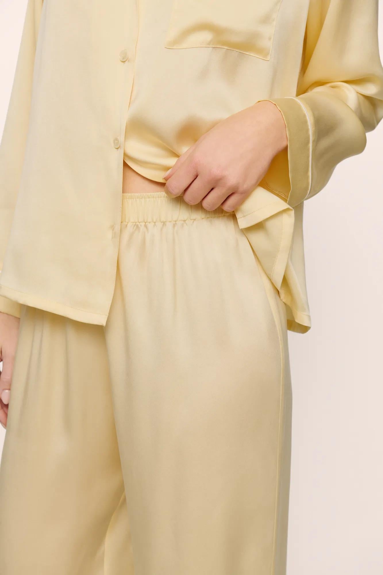 Model is wearing Inez Washable Silk Long PJ Set in  Sunshine/White
