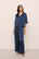 Model is wearing Inez Washable Silk Jacquard Relaxed Wide Leg Pant PJ Set in Navy