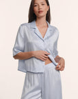 Model is wearing Inez Washable Silk Jacquard Relaxed Wide Leg Pant PJ Set in Powder Blue