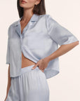 Model is wearing Inez Washable Silk Jacquard Relaxed Wide Leg Pant PJ Set in Powder Blue