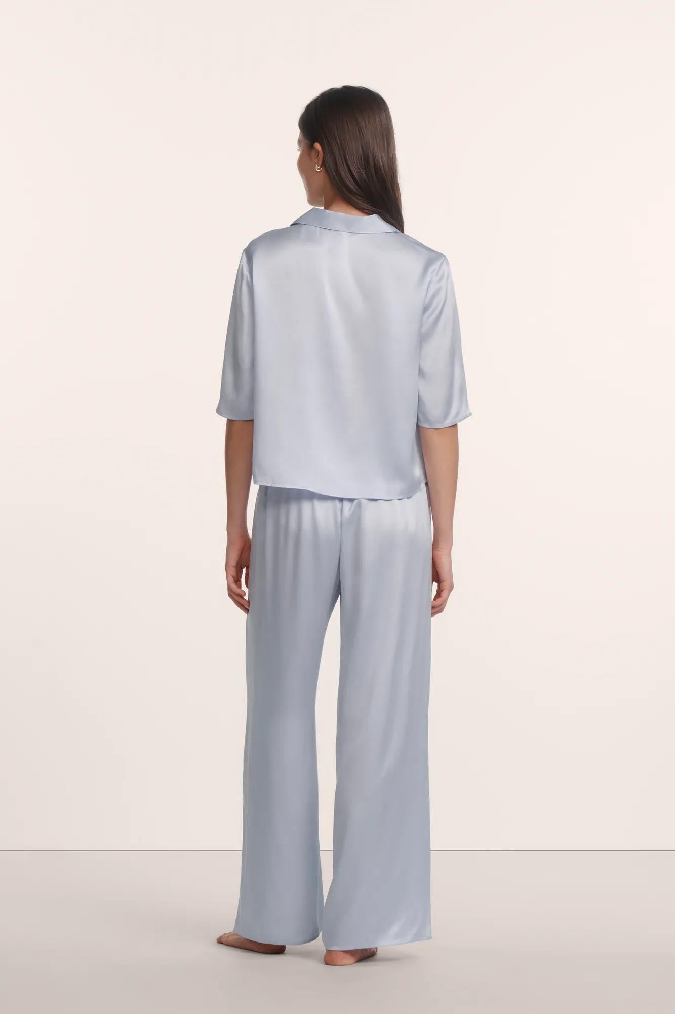 Model is wearing Inez Washable Silk Jacquard Relaxed Wide Leg Pant PJ Set in Powder Blue