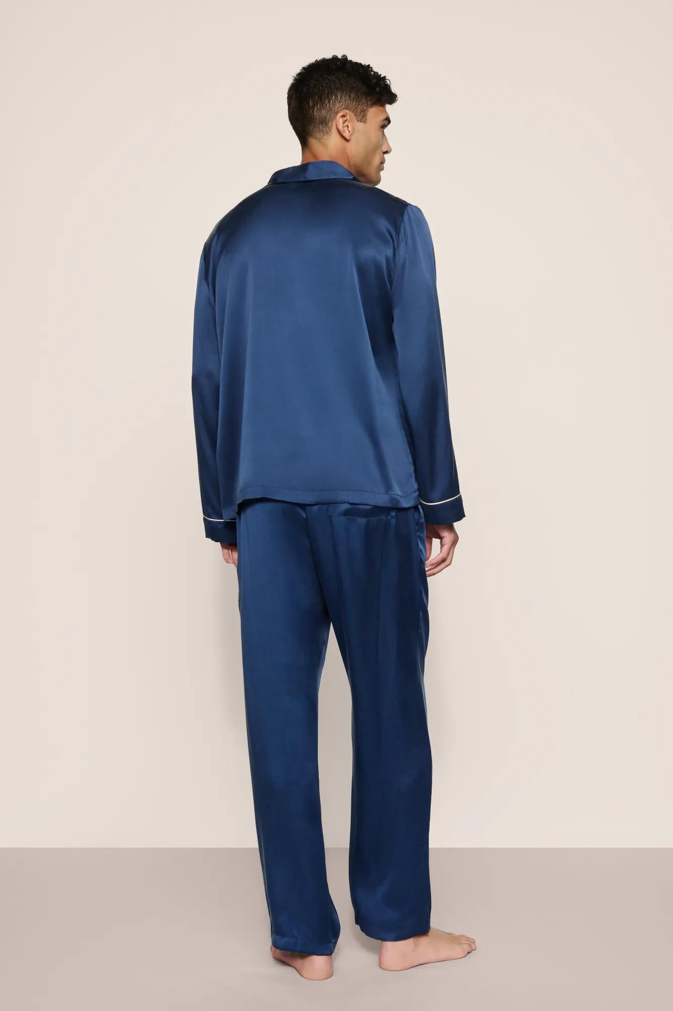 Model is wearing Charles Washable Silk Long PJ Set in Navy/Champagne