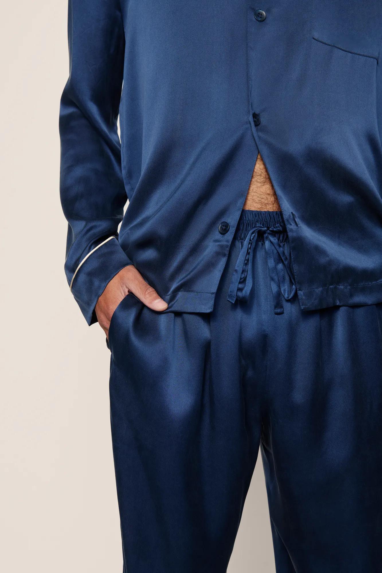 Model is wearing Charles Washable Silk Long PJ Set in Navy/Champagne