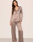 Model is wearing Inez Washable Silk Printed Long PJ Set in Animal Instinct Deep Taupe/Chocolate