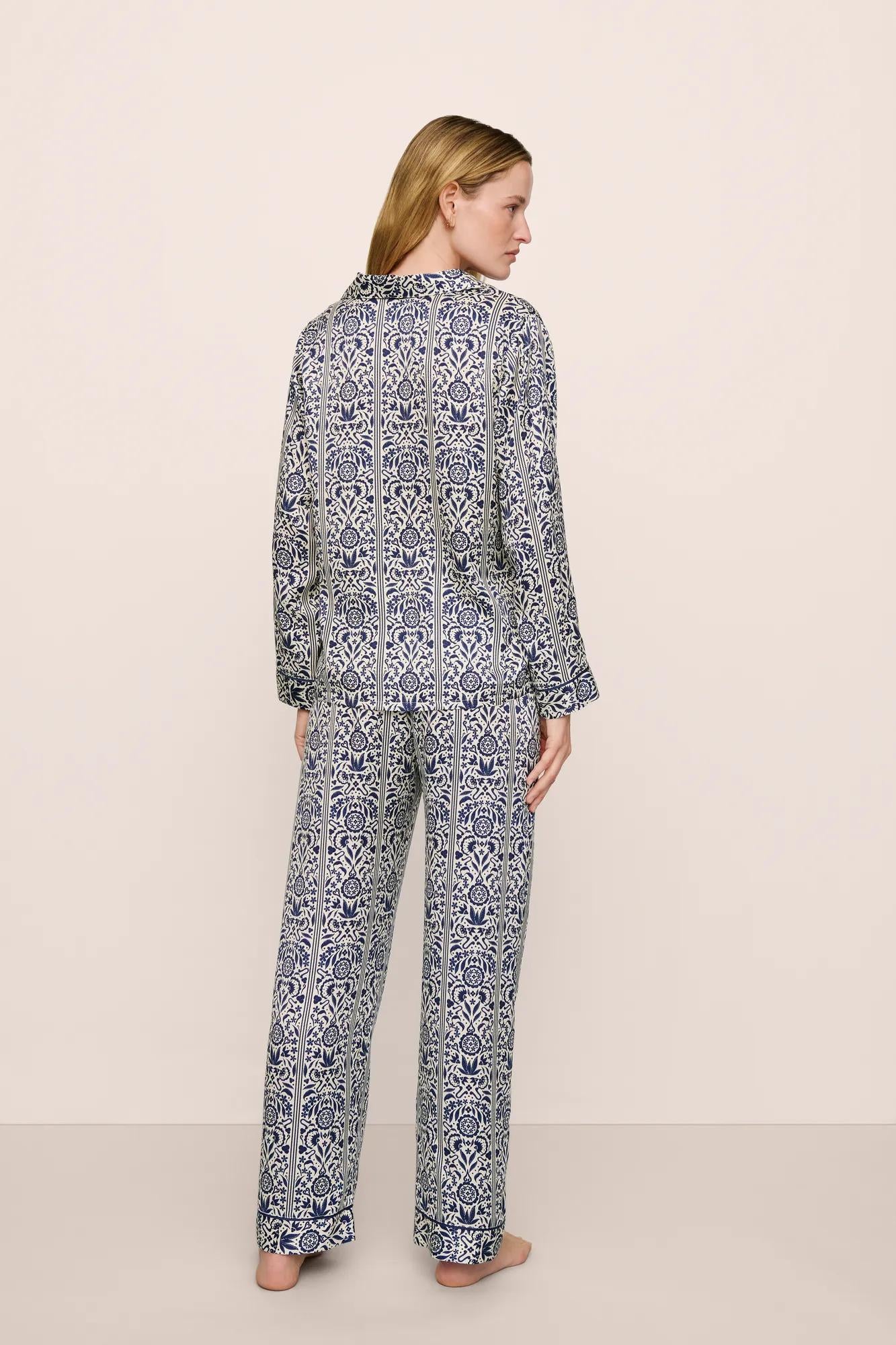 Model is wearing Inez Washable Silk Printed Long PJ Set in Azulejos Navy/Navy