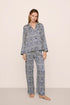 Model is wearing Inez Washable Silk Printed Long PJ Set in Azulejos Navy/Navy