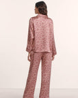 Model is wearing Inez Washable Silk Printed Long PJ Set in Bloomscape Misty Rose/Mesa Rose