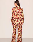 Model is wearing Inez Washable Silk Printed Long PJ Set in Botanical Flower Merlot/Merlot