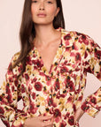 Model is wearing Inez Washable Silk Printed Long PJ Set in Botanical Flower Merlot/Merlot