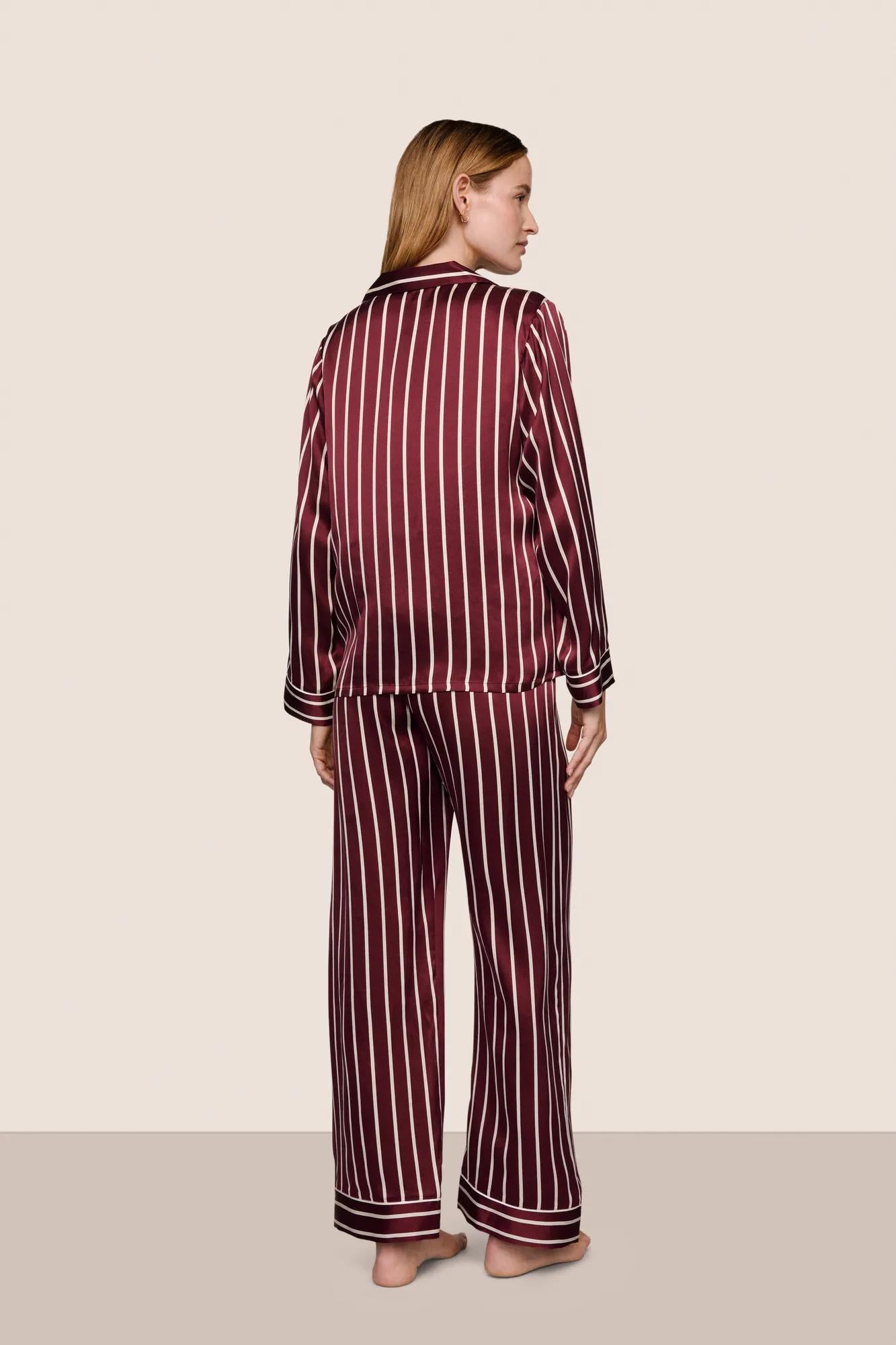 Model is wearing Inez Washable Silk Printed Long PJ Set  in Classic Stripe Bordeaux/Ivory