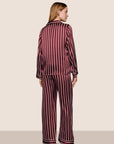Model is wearing Inez Washable Silk Printed Long PJ Set  in Classic Stripe Bordeaux/Ivory