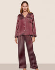 Model is wearing Inez Washable Silk Printed Long PJ Set  in Classic Stripe Bordeaux/Ivory