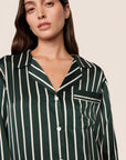Model is wearing Inez Washable Silk Printed Long PJ Set  in Classic Stripe Pine/Ivory