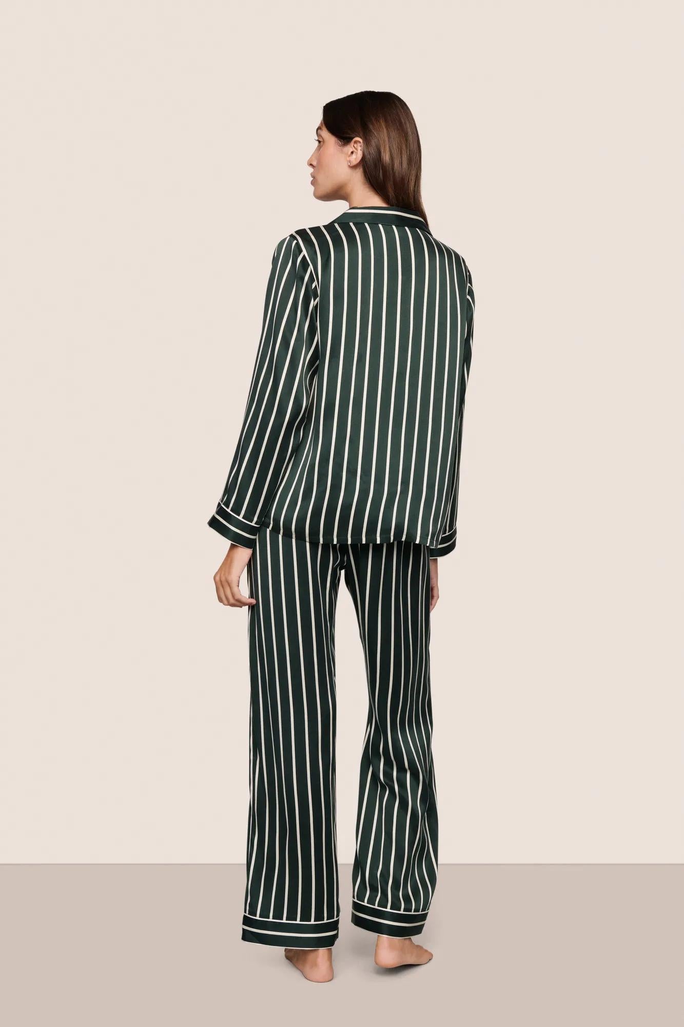 Model is wearing Inez Washable Silk Printed Long PJ Set  in Classic Stripe Pine/Ivory
