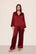 Model is wearing Inez Washable Silk Printed Long PJ Set in Dot Merlot/Ivory
