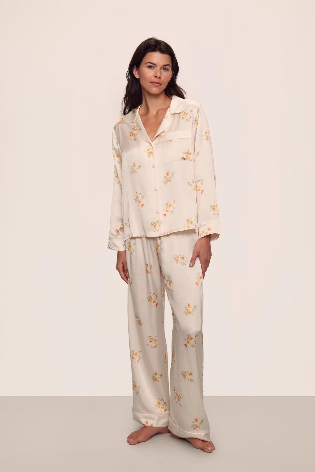 Model is wearing Inez Washable Silk Printed Long PJ Set in  Floral Bloom Peach Dust/Ivory