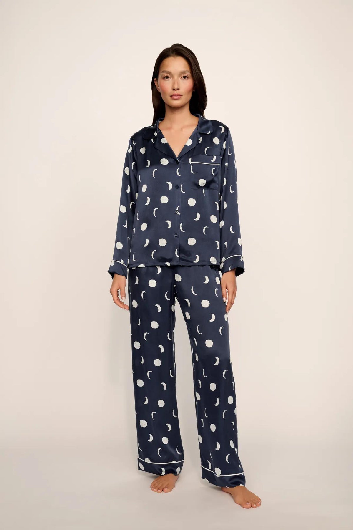 Model is wearing Inez Washable Silk Printed Long PJ Set in Moonlight Navy/Ivory