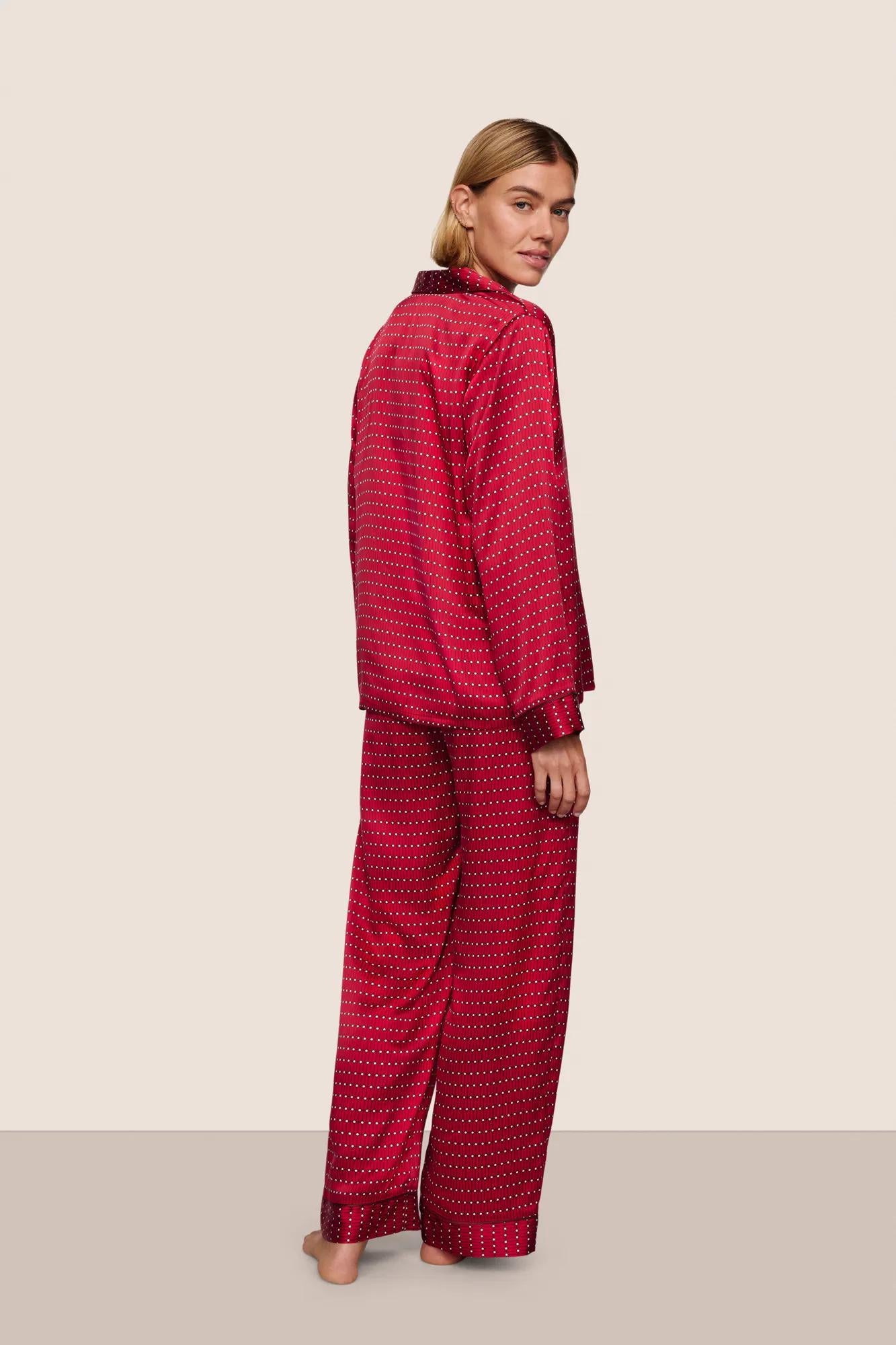 Model is wearing Inez Washable Silk Printed Long PJ Set  in Stained Glass Holly Red/Bordea