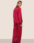 Model is wearing Inez Washable Silk Printed Long PJ Set  in Stained Glass Holly Red/Bordea