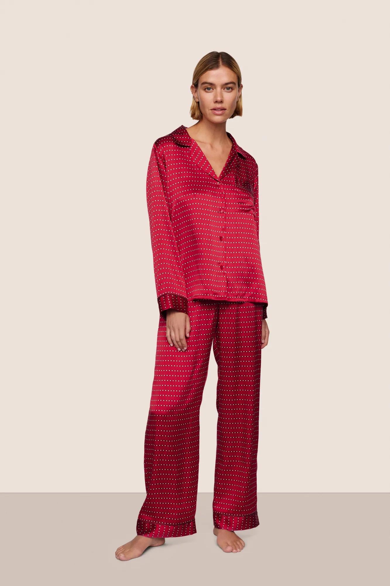 Model is wearing Inez Washable Silk Printed Long PJ Set  in Stained Glass Holly Red/Bordea