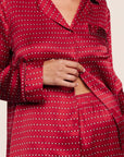 Model is wearing Inez Washable Silk Printed Long PJ Set  in Stained Glass Holly Red/Bordea