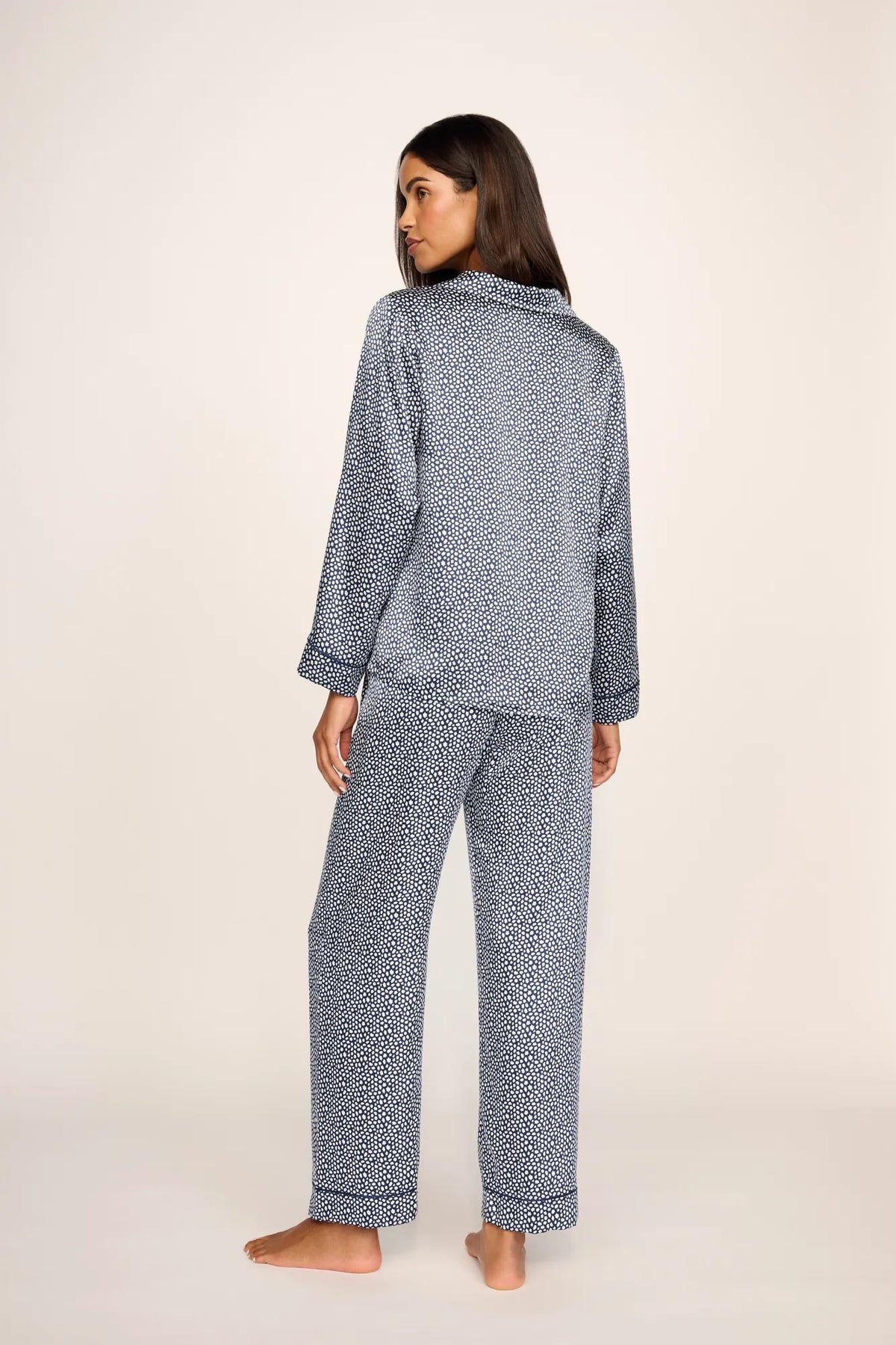 Model is wearing Inez Washable Silk Printed Long PJ Set in Starry Night Navy/Navy
