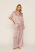Model is wearing Inez Washable Silk Relaxed Wide Leg Pant PJ Set in Animal Instinct Woodrose