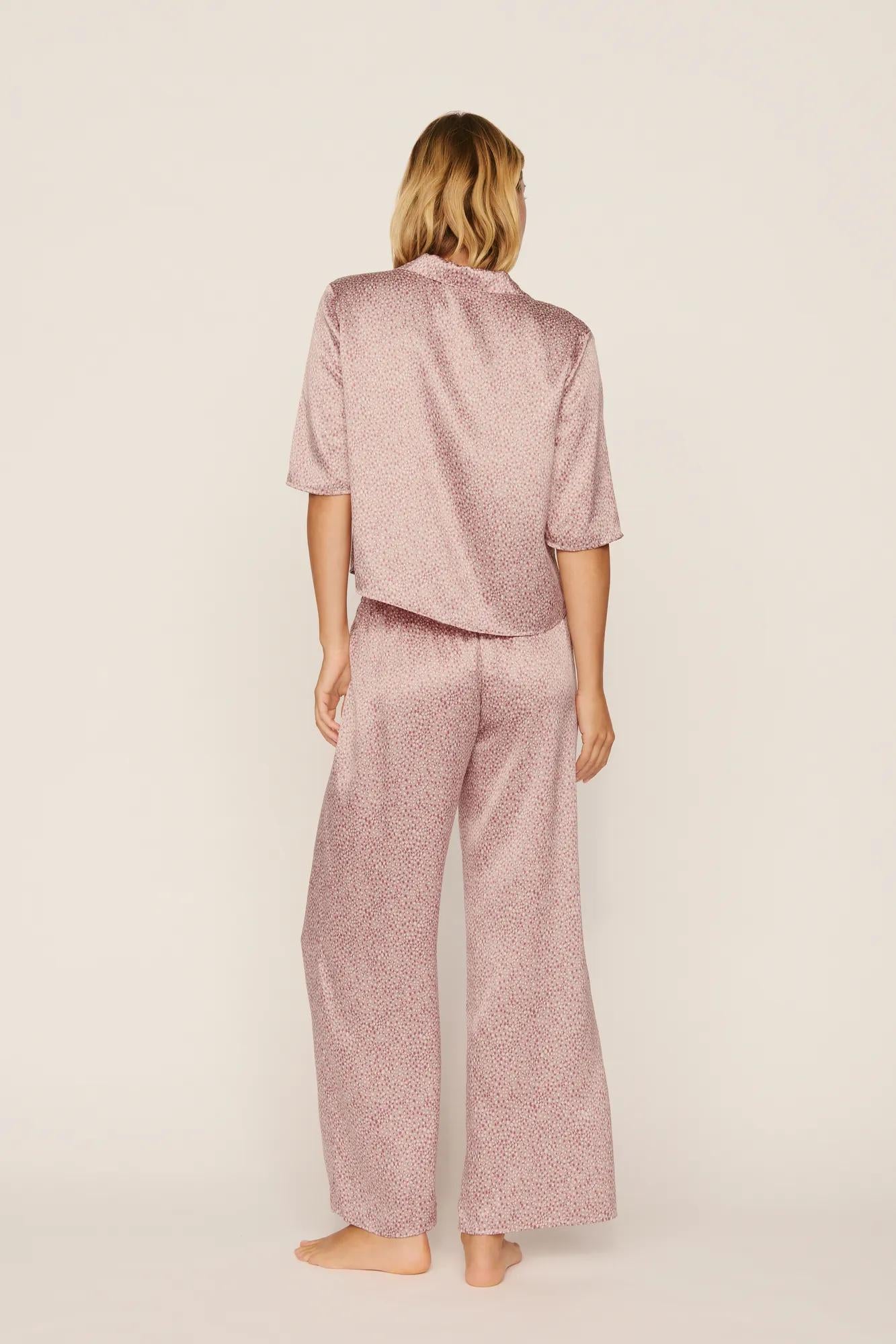 Model is wearing Inez Washable Silk Relaxed Wide Leg Pant PJ Set in Animal Instinct Woodrose