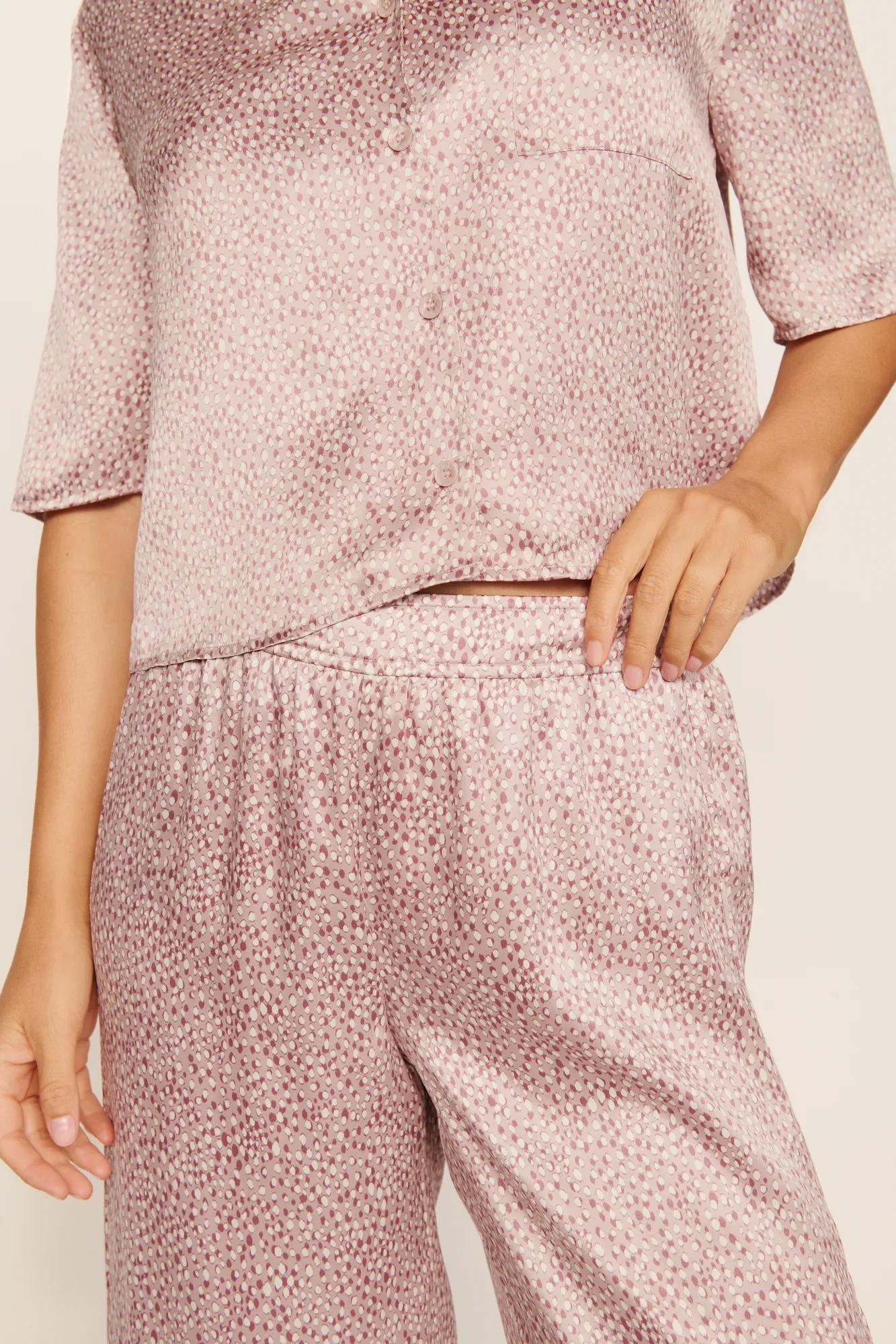 Model is wearing Inez Washable Silk Relaxed Wide Leg Pant PJ Set in Animal Instinct Woodrose