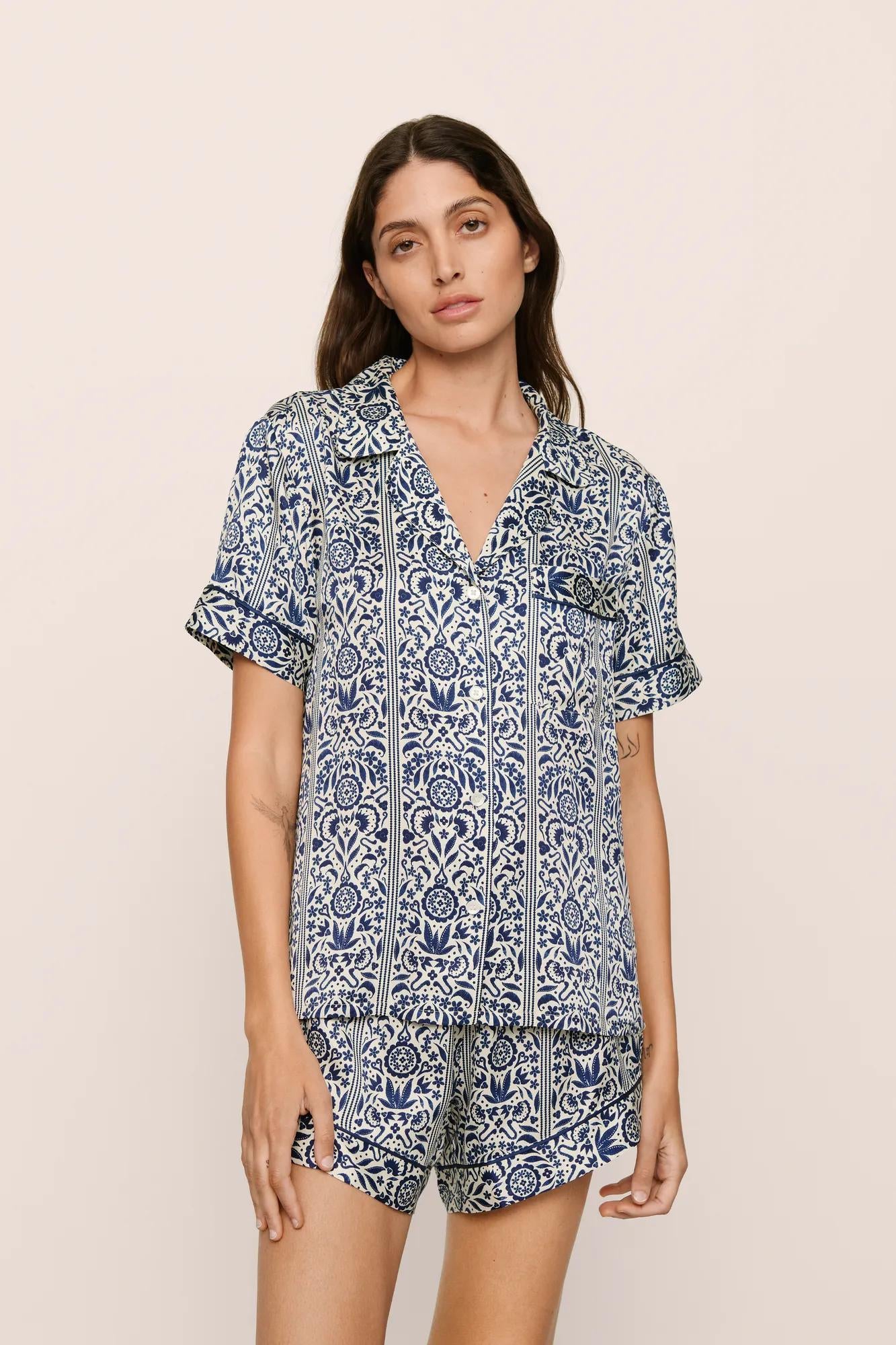 Model is wearing Inez Washable Silk Printed Short PJ Set in  Azulejos Navy/Navy