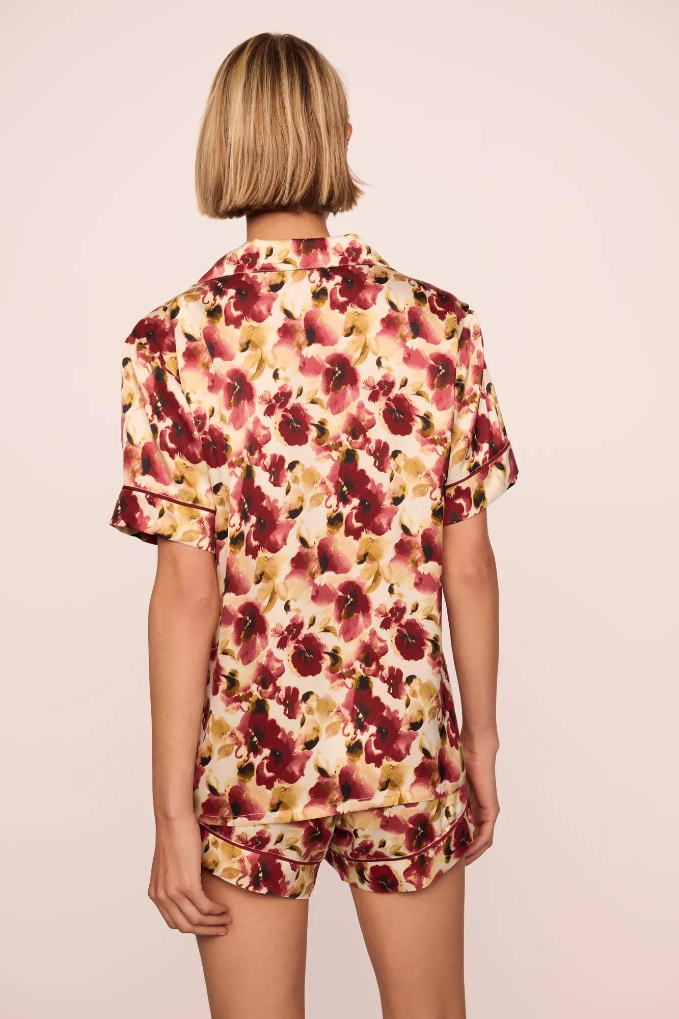 Model is wearing Inez Washable Silk Printed Short PJ Set in Botanical Flower Merlot/Merlot