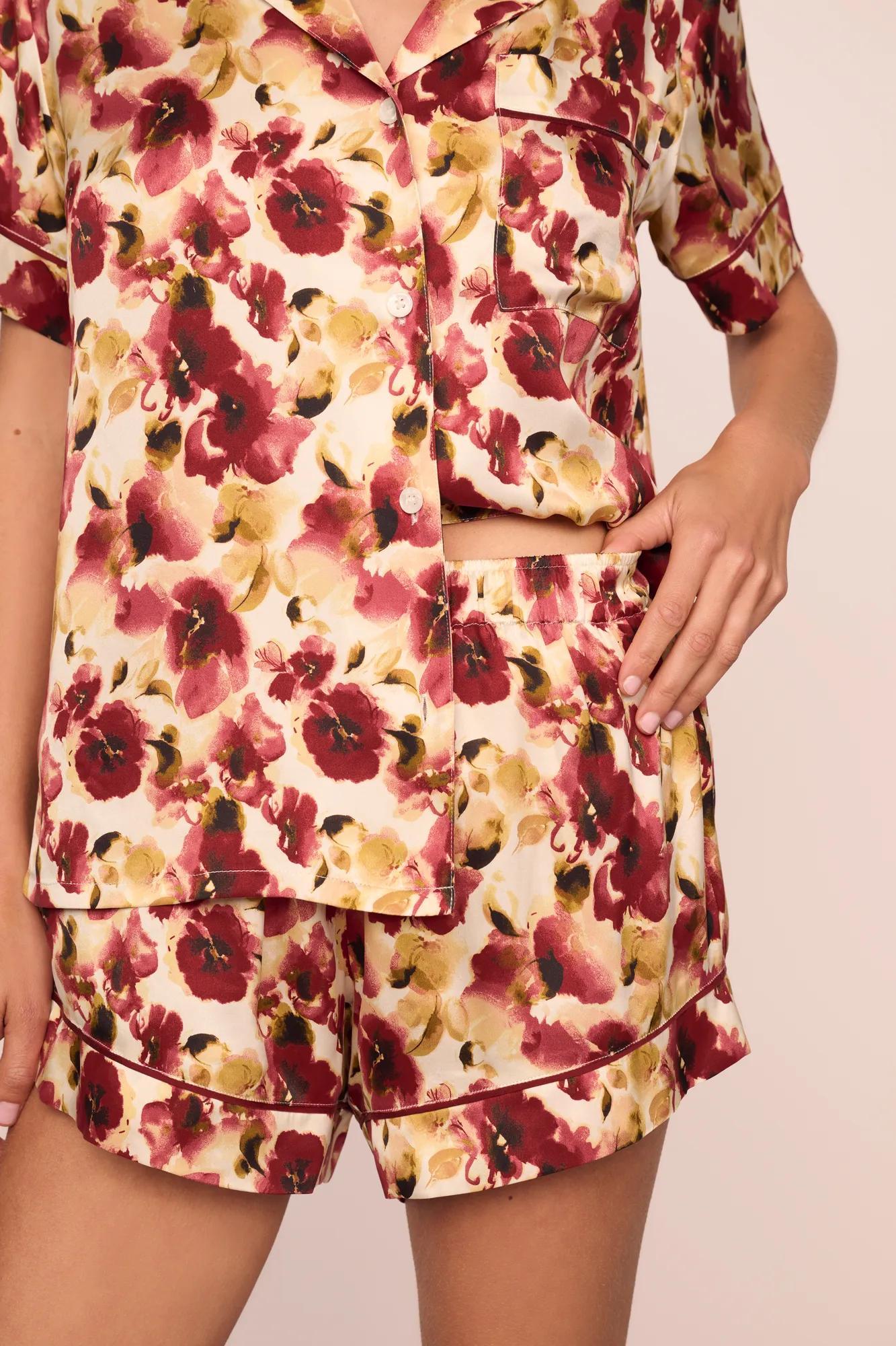 Model is wearing Inez Washable Silk Printed Short PJ Set in Botanical Flower Merlot/Merlot
