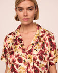 Model is wearing Inez Washable Silk Printed Short PJ Set in Botanical Flower Merlot/Merlot
