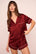 Model is wearing Inez Washable Silk Printed Short PJ Set in Dot Merlot/Ivory