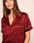 Model is wearing Inez Washable Silk Printed Short PJ Set in Dot Merlot/Ivory
