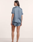 Model is wearing Inez Washable Silk Printed Short PJ Set in Duo Stripe Slate Blue/Ivory