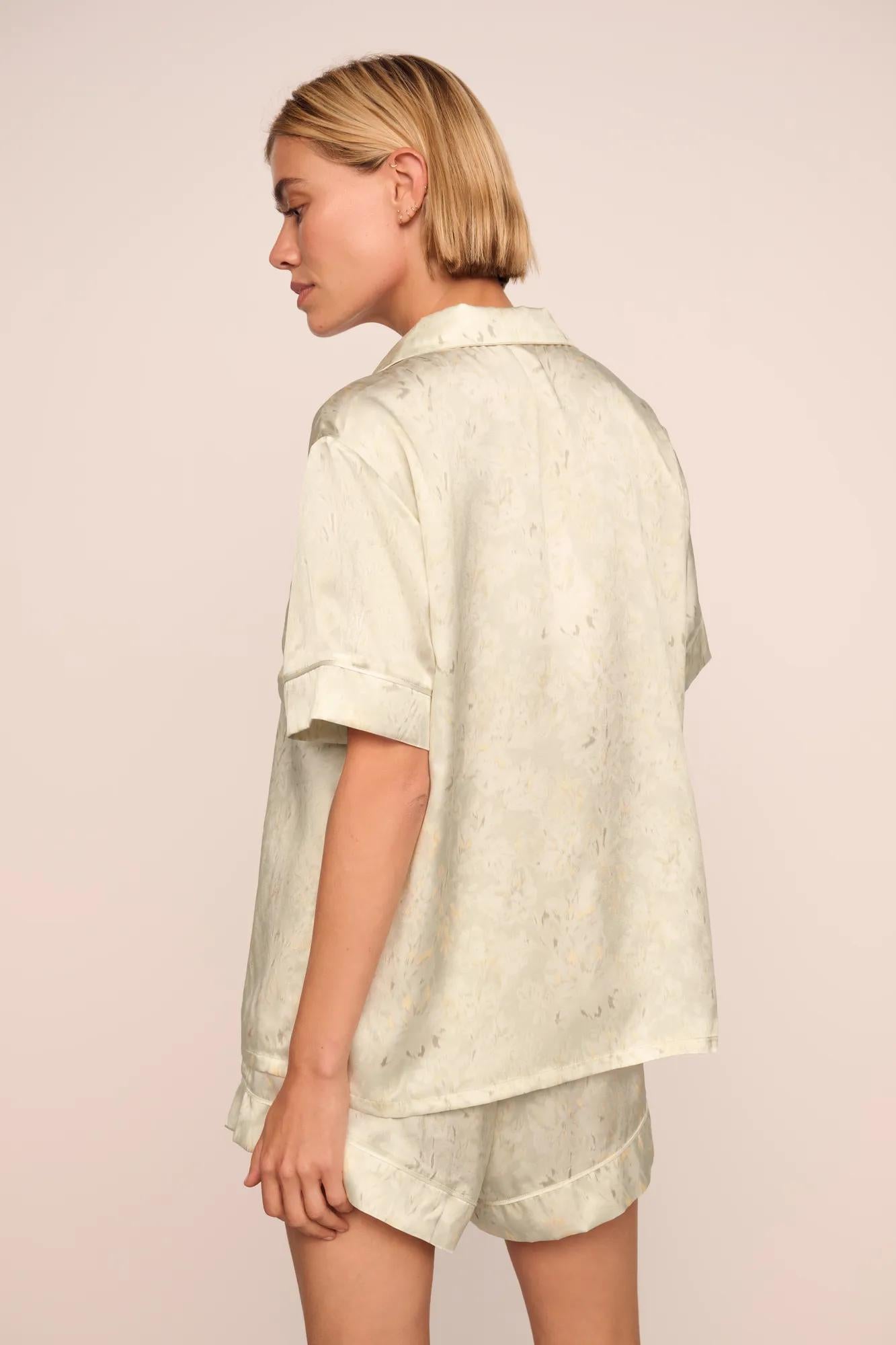 Model is wearing Inez Washable Silk Printed Short PJ Set in Foliage Mint Cream/Ivory