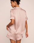 Model is wearing Inez Washable Silk Printed Short PJ Set  in Geosphere Silver Pink/Silverpi