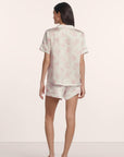Model is wearing Inez Washable Silk Printed Short PJ Set in Rose Garden Cameo Pink/Pale Pi