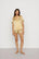 Model is wearing Inez Washable Silk Printed Short PJ Set in Stained Glass Sunbeam/Navy