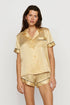 Model is wearing Inez Washable Silk Printed Short PJ Set in Stained Glass Sunbeam/Navy