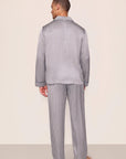 Model is wearing Inez Washable Silk Printed Long PJ Set  in  Tile Square Gray Dawn/Navy