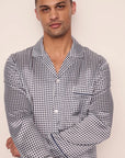 Model is wearing Charles Washable Silk Printed Long PJ Set  in  Tile Square Gray Dawn/Navy