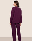 Model is wearing Frida TENCEL™ Modal Long PJ Set  in Plum/Ivory