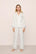 Model is wearing Inez Washable Silk Jacquard Long PJ Set in ClassicStripeJacquardPea/Na