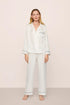 Model is wearing Inez Washable Silk Jacquard Long PJ Set in ClassicStripeJacquardPea/Na