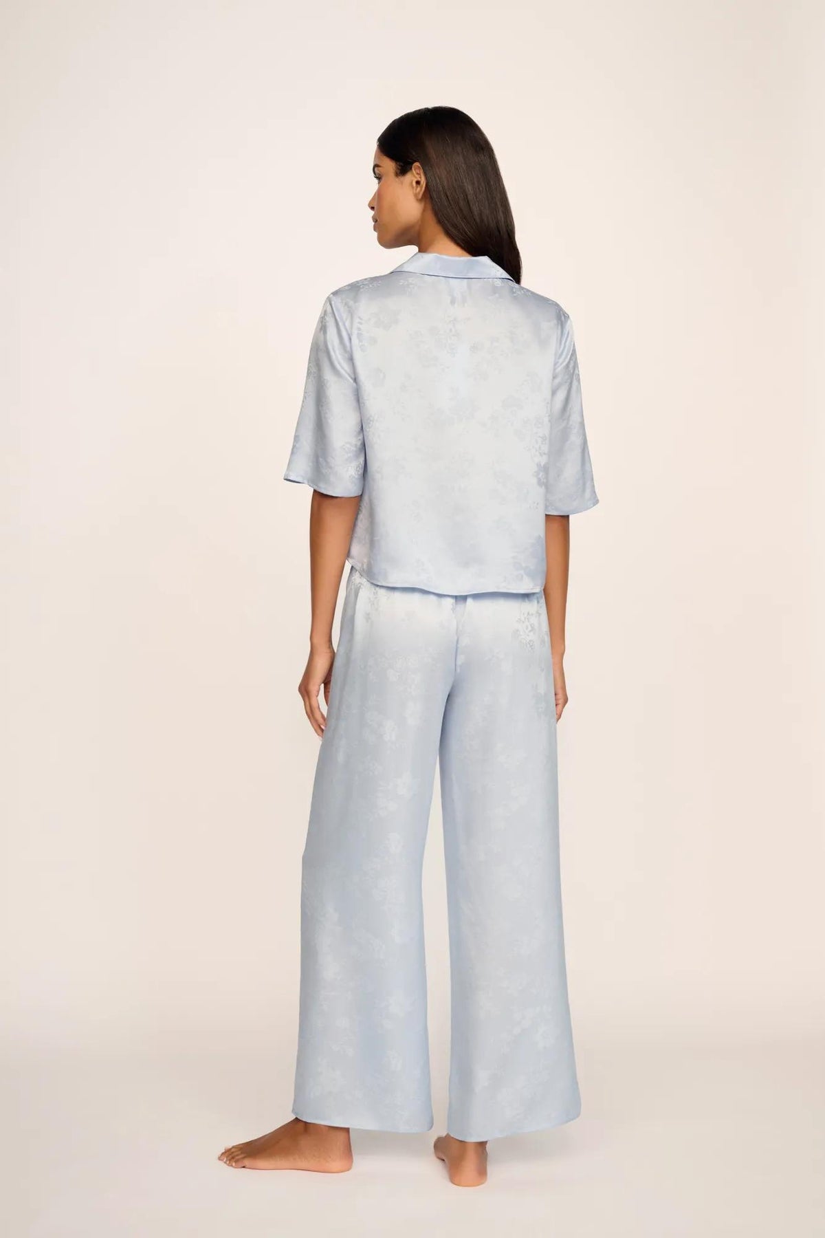 Model is wearing Inez Washable Silk Jacquard Relaxed Wide Leg Pant PJ Set in Floral Vine Powder Blue